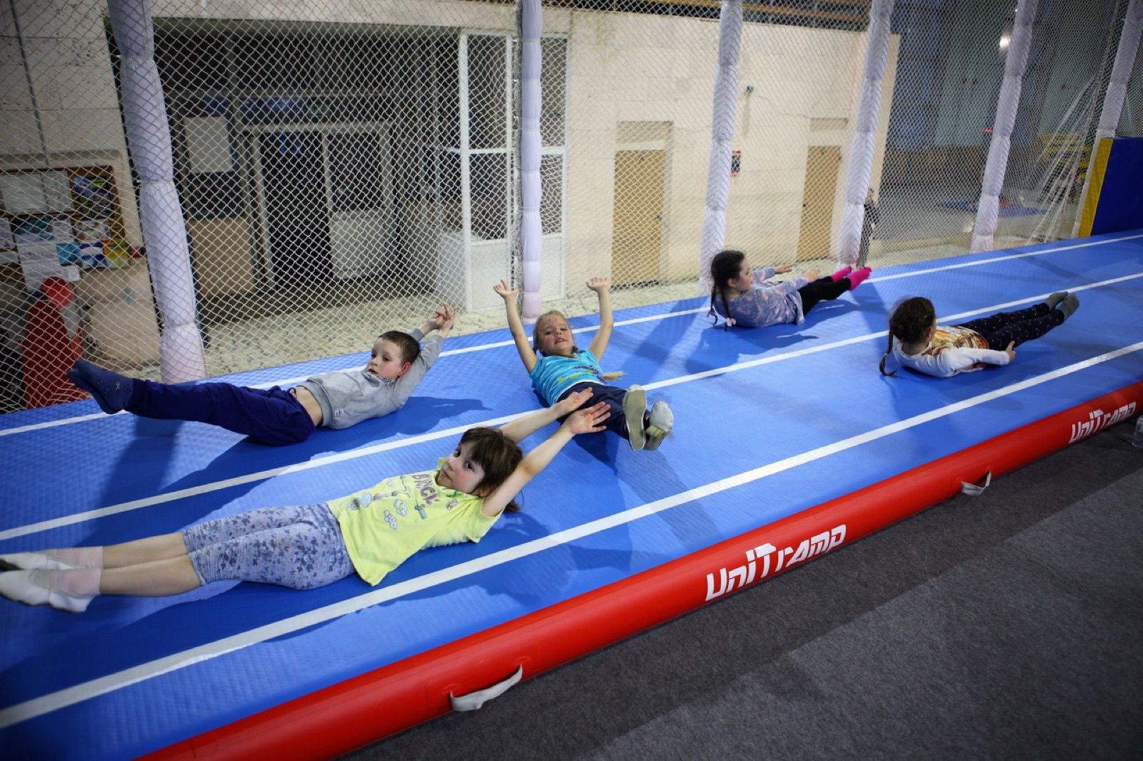 Inflatable acrobatic track
